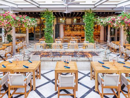 Open patio with tables set with table settings